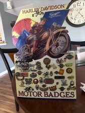 Harley Davidson Pins On Old Harley Display Great Condition.