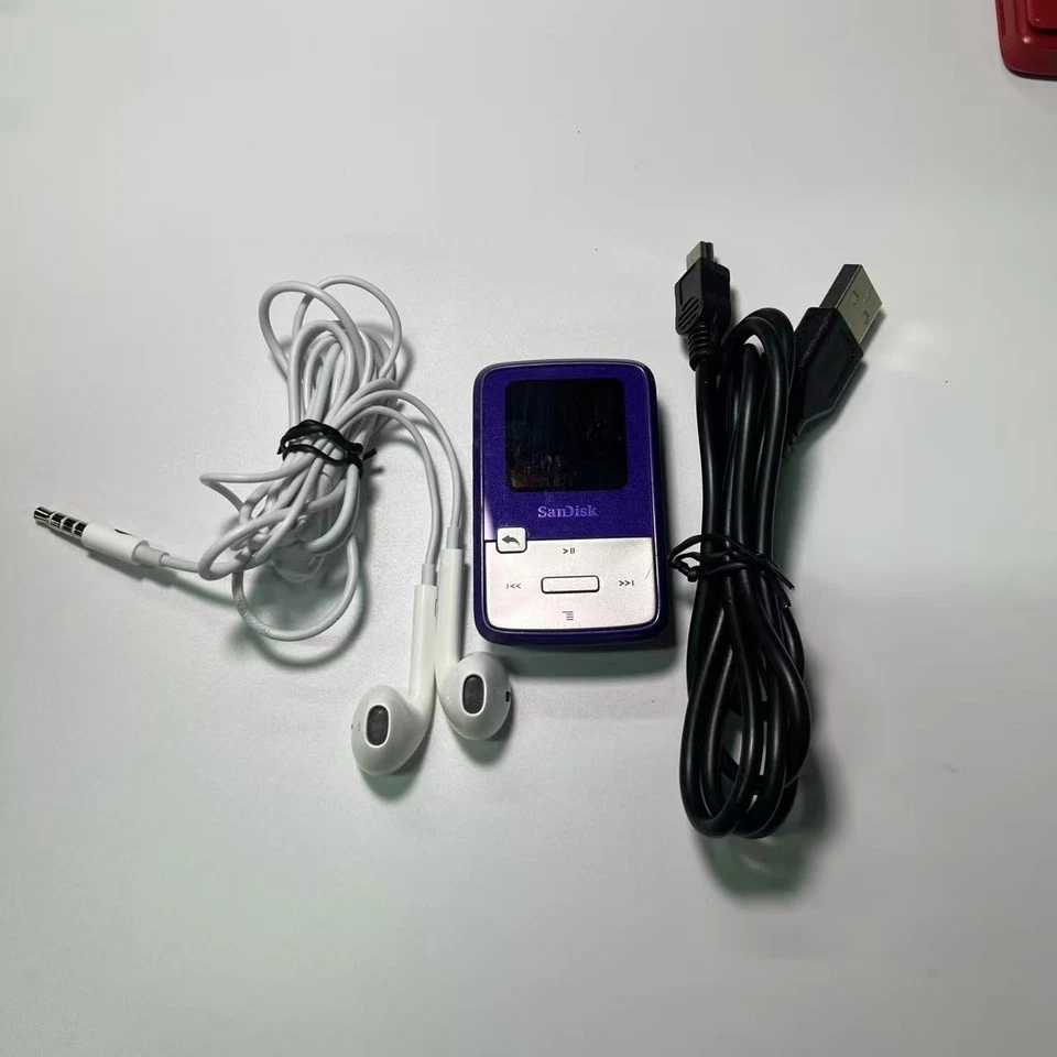 Reproductor multimedia digital SanDisk Sansa Clip Zip (4 GB) MP3 y paquete de cable usado Foto 2 de 4