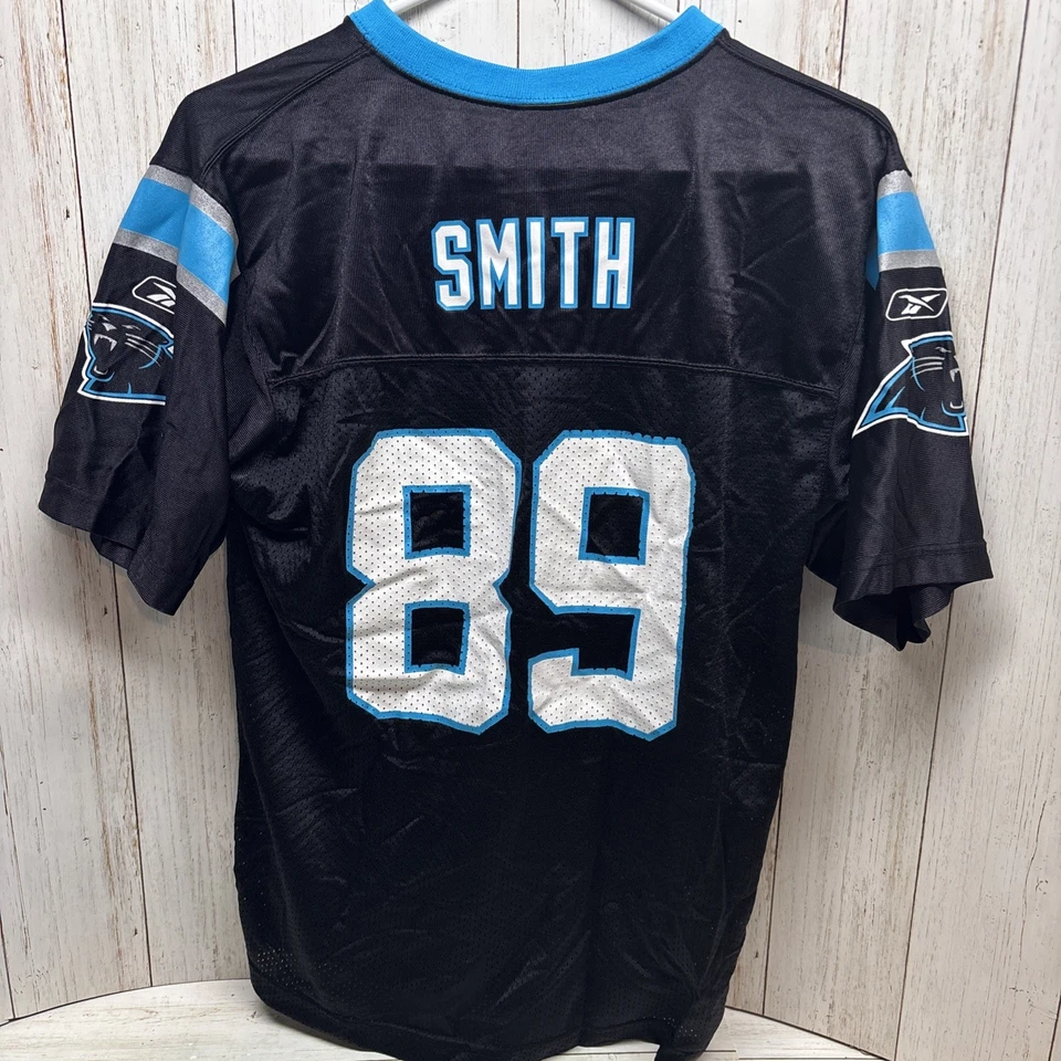 Camiseta de futebol americano Carolina Panthers Steve Smith Reebok NFL tamanho Youth L 14-16 preta - Imagem 4 de 4