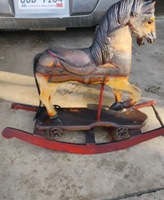 Vintage Antique Hand Carved Wooden Toy Rocking Horse 27  Cast Iron Wheels