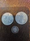 2 Walking Liberty Hal Dollars and 1 Barber Dime