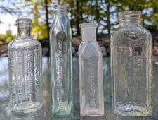 4 Antique Apothecary Bottles Embossed Lot Collection