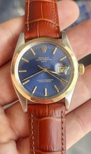 Rolex Oyster Perpetual Date - 34mm Steel & Gold - Sunburst Blue Dial