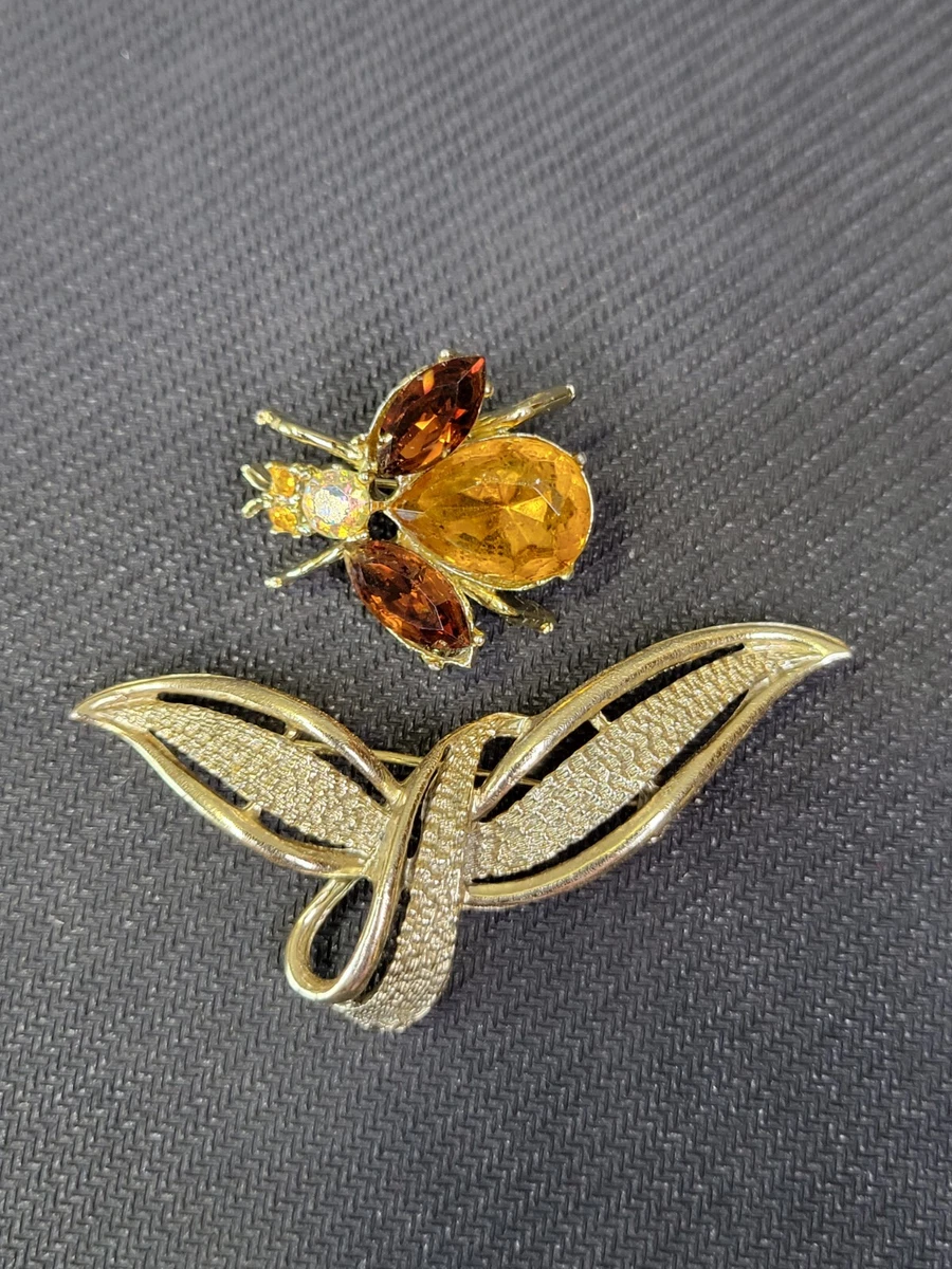 Vintage designer costume jewelry deals