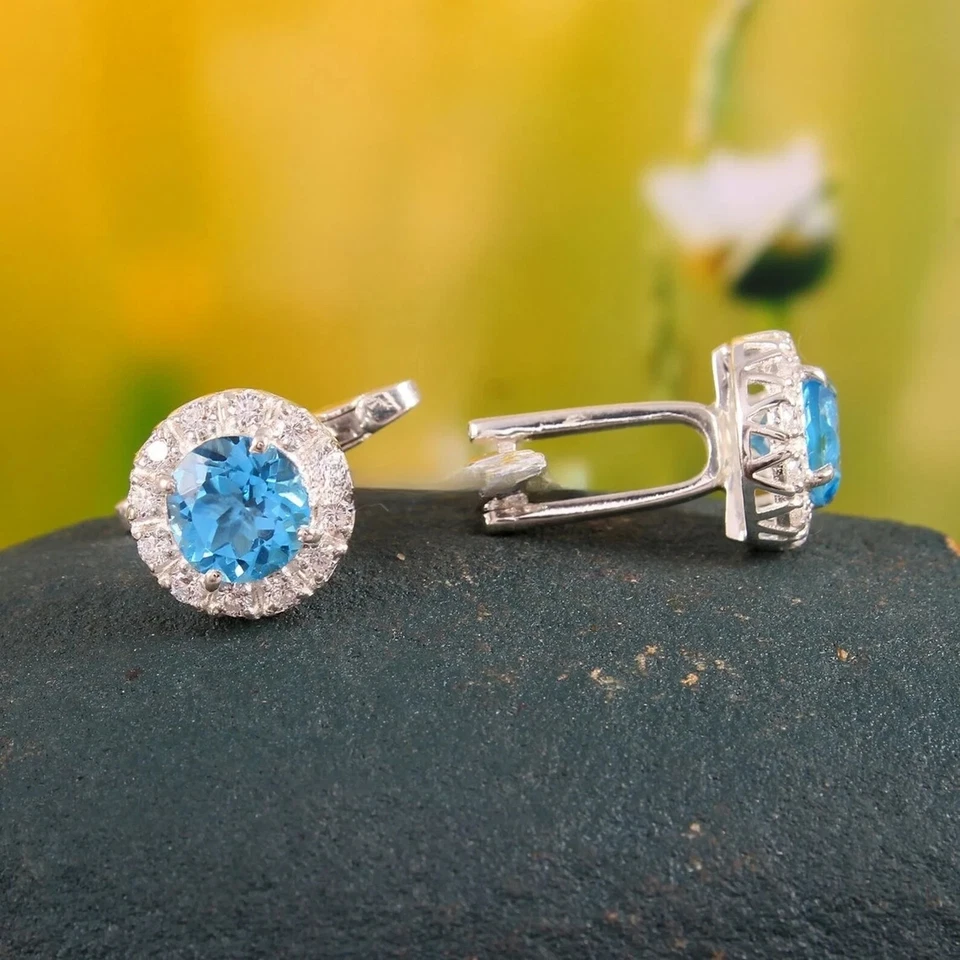 Gemelos de topacio azul creados en laboratorio de corte redondo de 2,50 quilates para hombre enchapados en oro blanco de 14 quilates Foto 3 de 4