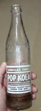 CONROE TEXASPOP KOLA  SODA BOTTLE 12 OZ ACL CARL FORD