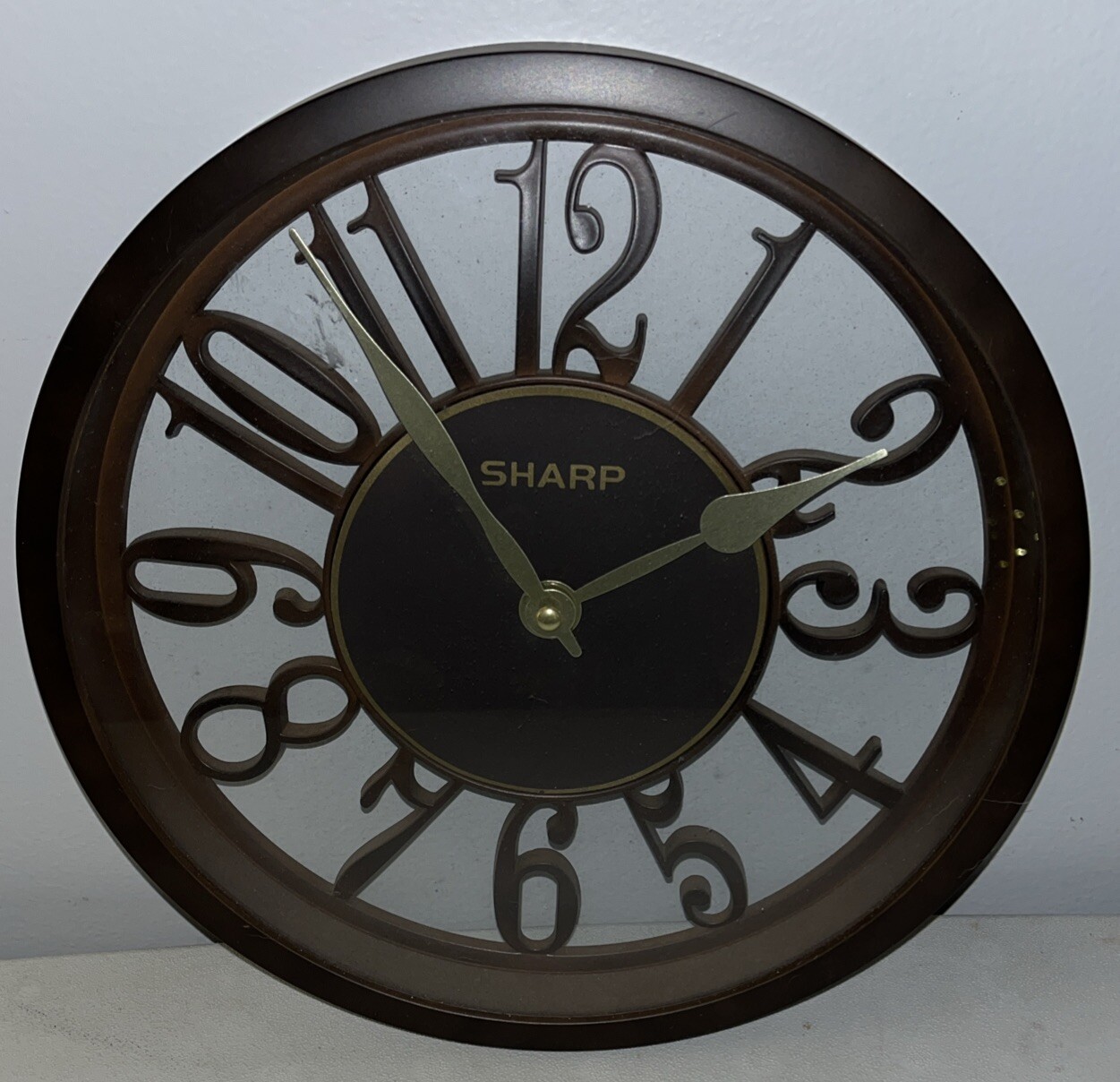 SHARP Brand Hollow Molded Brown Frame Round Wall Clock 11” Quartz Movement