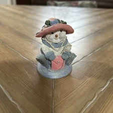 The Encore Group 2000 Playing Dress Up Snowman Figurine.