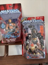Mattel Masters of the Universe Ice Armor He-Man  & Battle Armor NIB.  MOTU