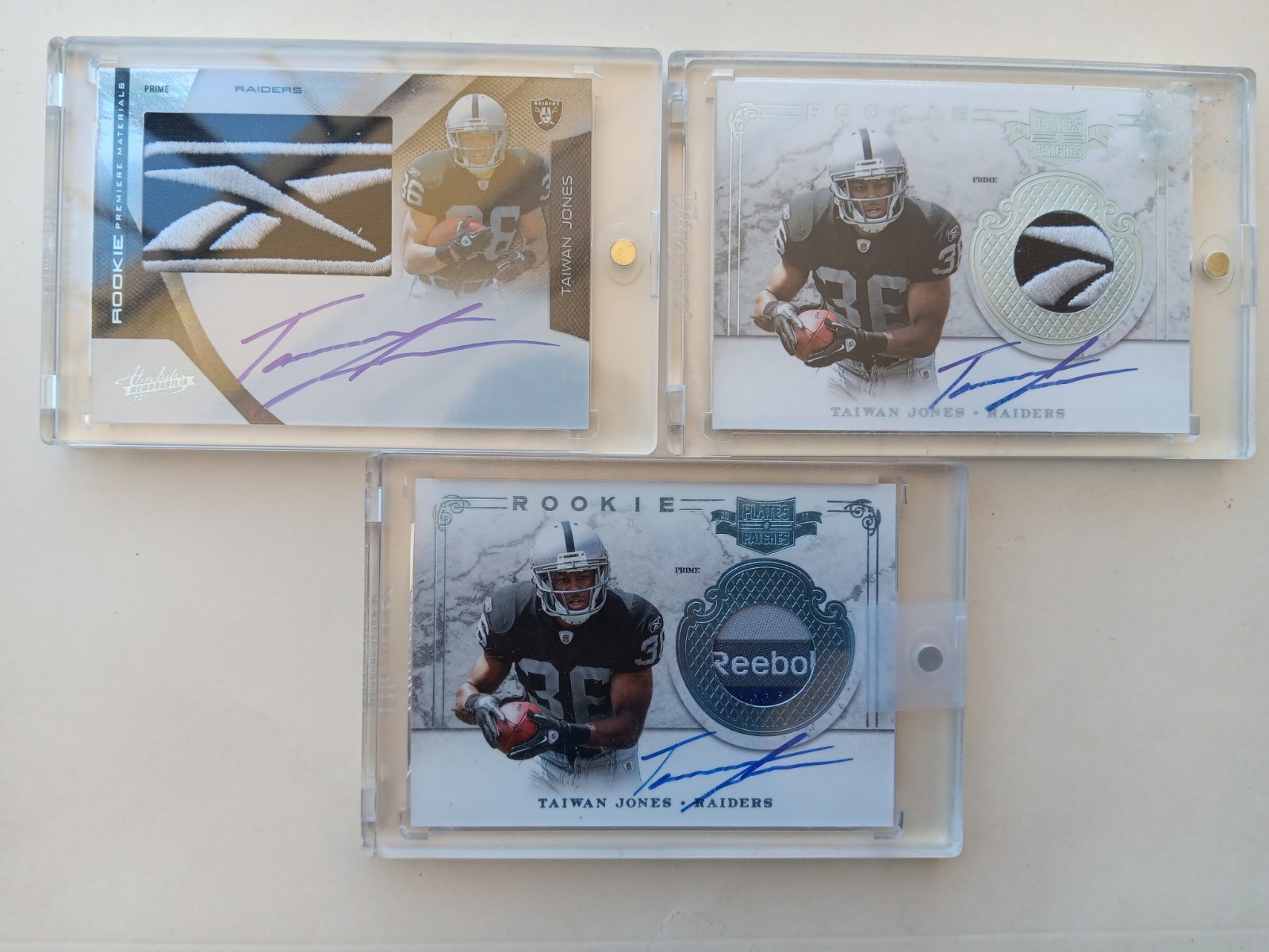 Rookie Taiwan Jones Autographed Plates And Patchs 1/1 Lot Of Three  On Card Auto