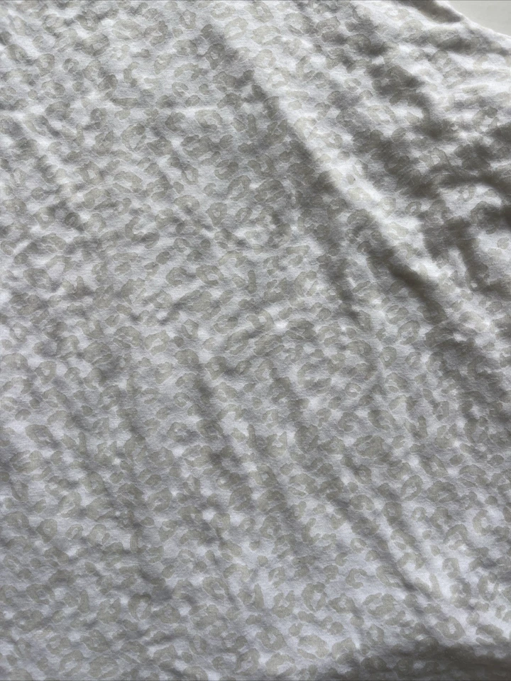 TANQUE SIN MANGAS VICTORIA’S SECRET GUEPARDO BLANCO TALLA: M/L Foto 3 de 4