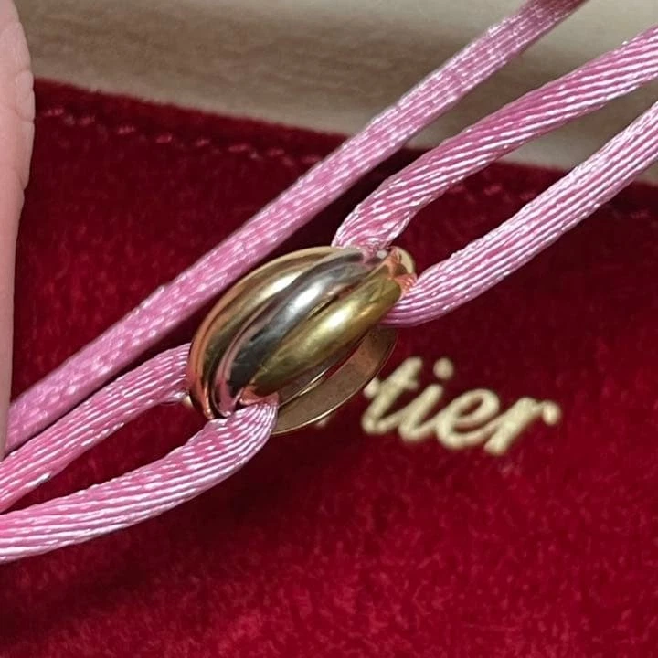 Pulsera Cartier Baby Trinity Oro Rosa Amarillo Blanco 18K Usada Foto 2 de 4