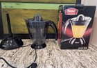 Parini Appliances Electric 34oz Juicer Automatic Drive Two Cone Sizes Opened box