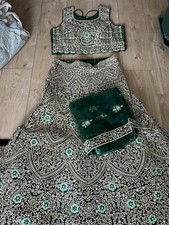 Grüne schwere Lehenga Größe 10/12 Spiegelarbeit
