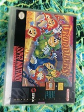 Troddlers SNES Cartridge And Instruction Booklet