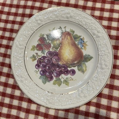 Three Homer Laughlin Eggshell 7  Salad Plates. Worn Design