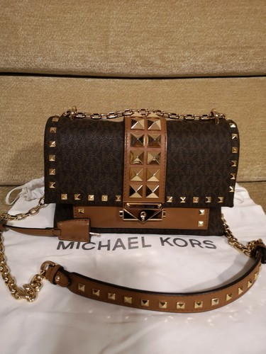 MICHAEL KORS ZAINO RHEA IN PELLE CON BORCHIE Donna Black | Mascheroni Moda