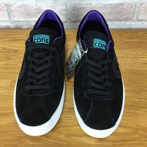 tenis baixo preto e branco