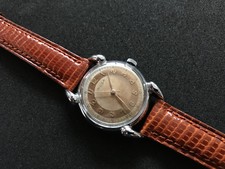 Montre vintage REGA, à remontage manuel, ca. 1950-60