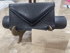 Levenger Fielding textured black leather card case with a flap closure