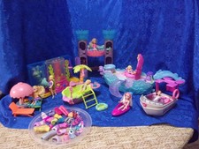 Polly Pocket lot of pool party playsets+ 7 dolls ,clothes ,shoes and extras .