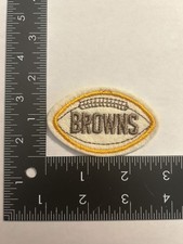 1970s VINTAGE NFL FOOTBALL SHAPED 2.75" PATCH BROWNS BROWN TEXT GOLD BALL