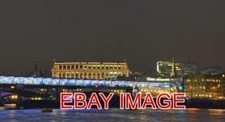 PHOTO  BLACKFRIARS LONDON. THE RAILWAY BRIDGE AND UNILEVER HOUSE AT NIGHT.
