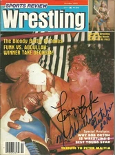 TF53  Terry Funk vs Abdullah the Butcher signed vintage wrestling magazine w/COA