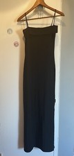Long Stretchy Black Sexy Dress With Spaghetti Straps And Slid On The Bottom