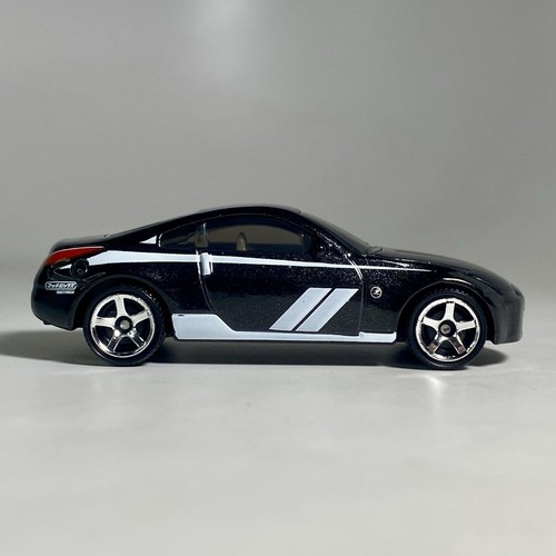 Matchbox Nissan Z (350Z) Pearl Black 1:64 modellino auto diorama pressofuso da collezione - Foto 5 di 12
