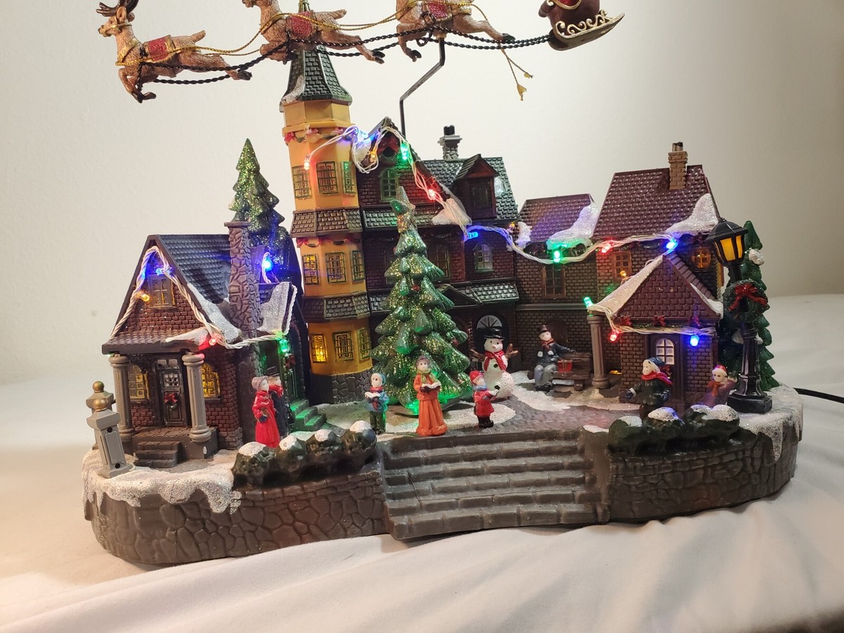 Musical Village Christmas Moving Santa Sleigh Buildings