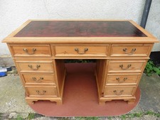ANTIQUE STYLE SOLID PINE, RED LEATHER TOP TWIN PEDESTAL KNEE HOLE WRITING DESK.