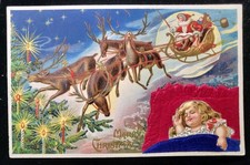 Vintage SANTA CLAUS In Sled Deer Red Suit Little Girl Silk Embossed Postcard