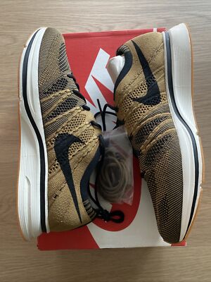 nike flyknit trainer gold
