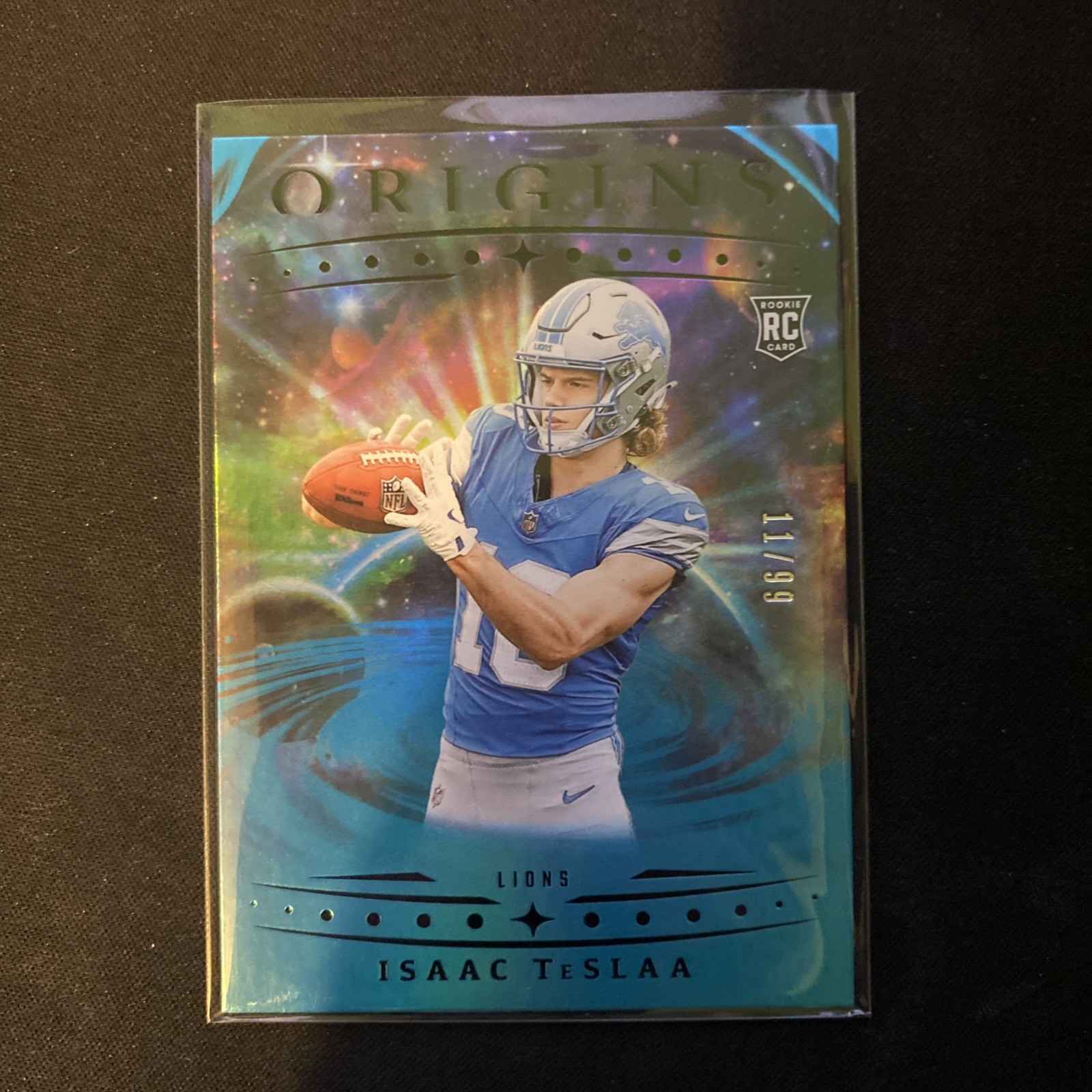 2025 Panini Origins - Rookies Isaac Teslaa, Isaac Teslaa #118 Blue /99 (RC)