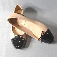 Zapatos para mujer Arezzo de bloque bajo tostados y negros sin cordones con pajarita hechos en Brasil