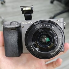 Sony Alpha A6000 Mirrorless Digital Camera w/16-50mm Lens Charger Battery 95 new