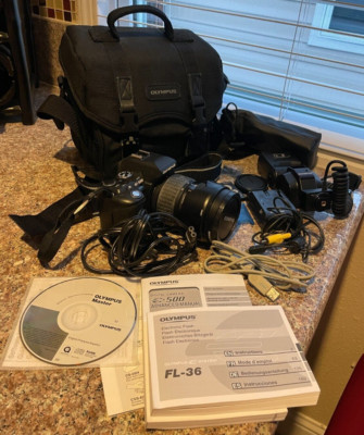 Olympus E-500 8MP Digital SLR Camera w/ 11-22 F2.8-3.5 Lens, Electronic Flash