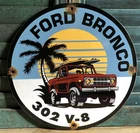 VINTAGE 1973 DATED FORD BRONCO 302 V8 V-8 PORCELAIN DEALER SALES SIGN