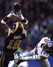 Kenny Britt signed NFL football 8x10 photo W/Cert Autographed 03