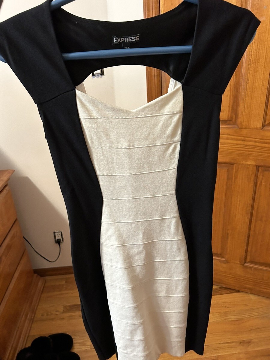 express black and white dress Pinstripe Strapless Mini white stripes positioned to contour and celebrate your shape Black and White Striped Dress