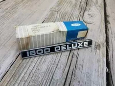 NOS Ford Cortina Mk II Emblem Badge 1600 DeLuxe MkII Mk2 Escort Capri