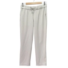 Lululemon On the Fly 7/8 Woven Pants Silverstone Gray Cream Size 6 Travel Woven