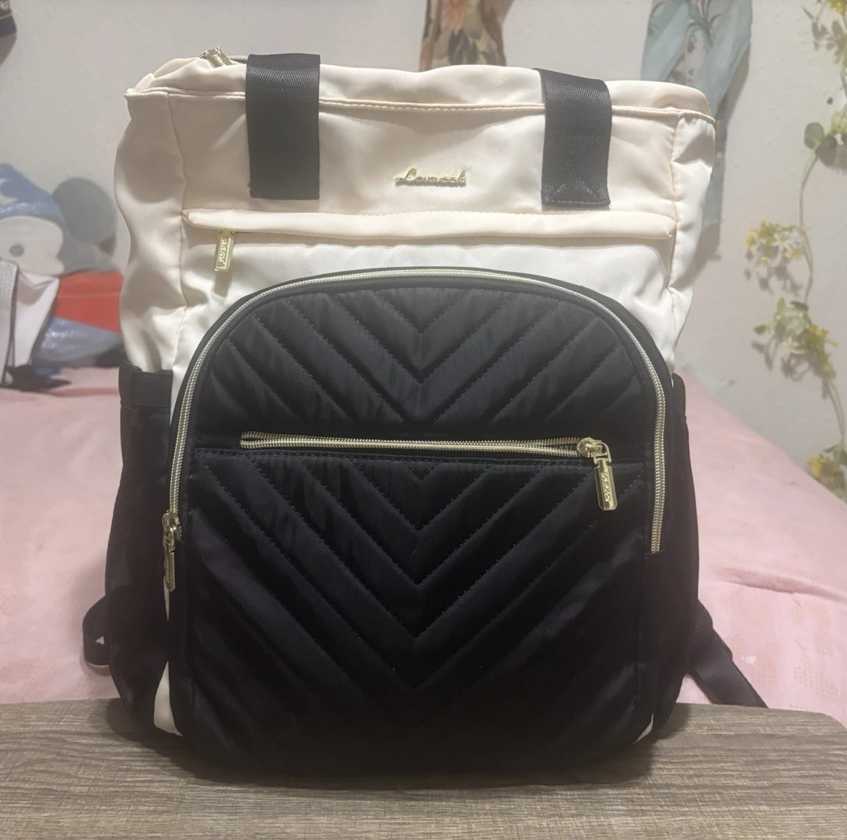 black and white quilted leather backpack Personalised Black+White Cowhide for Work, School College gym bag or travel companion on long journeys. CHANEL Black quilted lamb leather