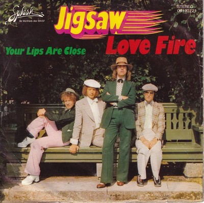 -0263- Jigsaw - Love Fire -7''-Single- vg+