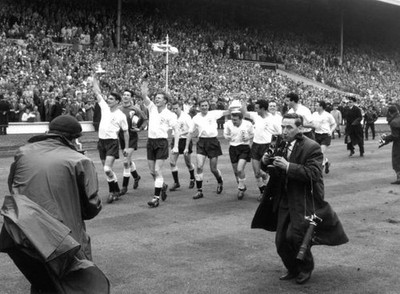 Tottenham Hotspur players carry the FA Cup trophy on a lap of hono- Old Photo