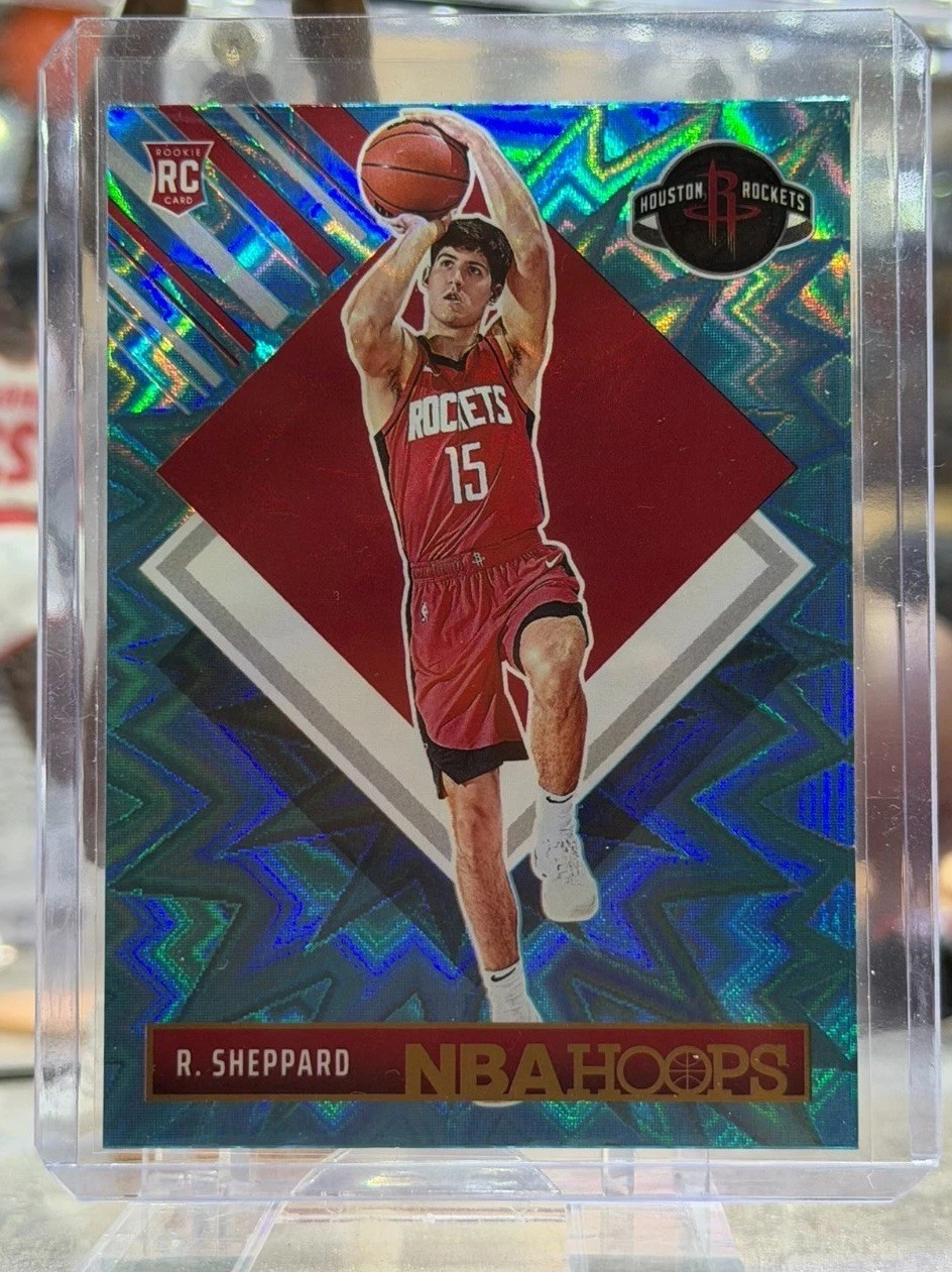 2024-25 Panini Hoops #291 Reed Sheppard Rookie Tribute Teal Explosion Rockets RC