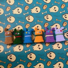 Handmade Crochet Dog Finger Puppet with Surprise Outfit