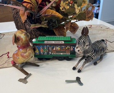 Three Vintage Tin Wind Up Toys Jumping Dog Jumping Zebra With Keys And Cable Car
