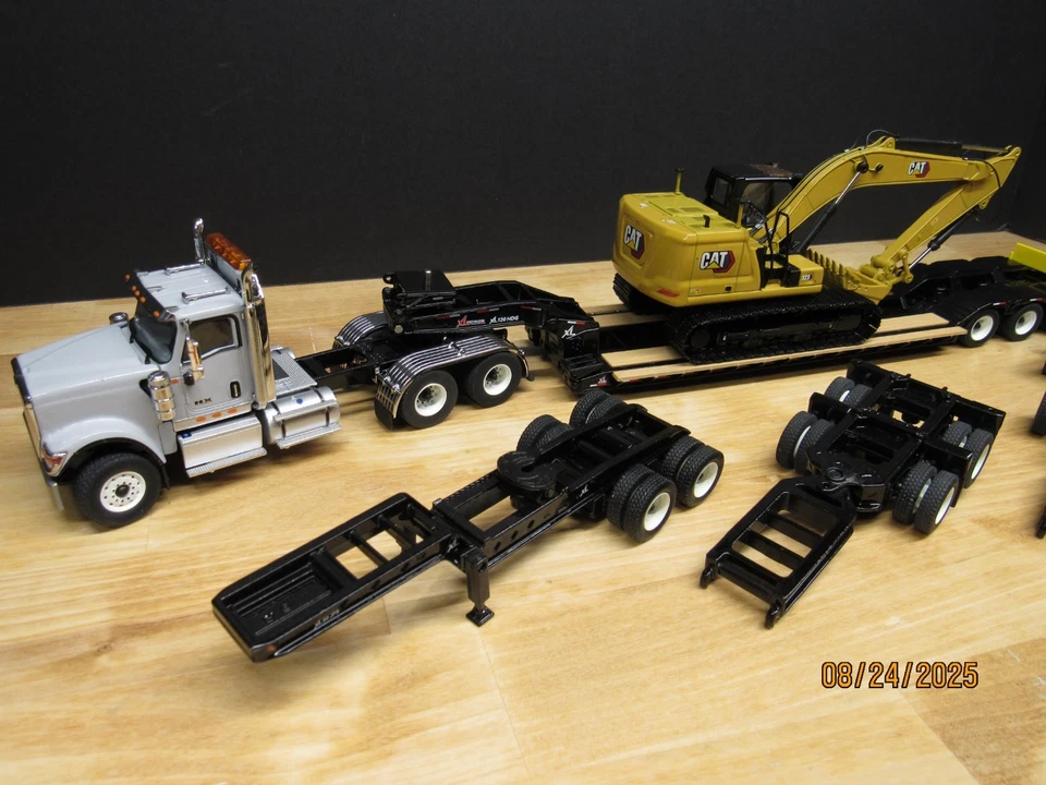 1:50 Diecast Masters International HX520 w/ Lowboy & CAT 323 Excavator w/ Tools - Image 4 of 4